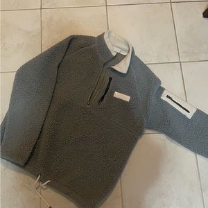 fluffy fila half zip